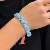 Pulseira Azul e Prata de Festa Cravejada de Zircônias Bouton