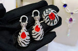 Anel Ajustável Grande Branco e Preto Zebra com Pedra Vermelha Ruby de Festa