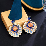 Brinco de Festa Flor Azul e Laranja com Zircônias Laszine Shop