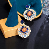 Brinco de Festa Flor Azul e Laranja com Zircônias Laszine Shop